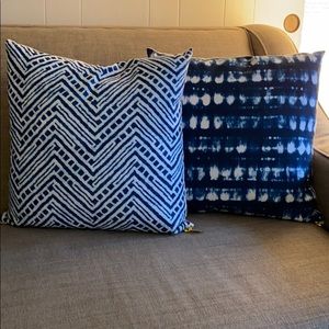 Two navy and natural tie dye throw pillows